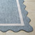 Cocoa Beach Blue and Cream Scalloped Rug corner
