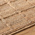 Compass Rose Handmade Jute Woven Rug edge close up