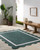 Cocoa Beach Dark Green and Cream Scalloped Rug outdoor room view