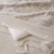 Coconut Grove Luxury Botanical Jacquard 3-Piece Duvet Set close up texture buttons and ties