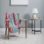 Club Cabana Pink and Turquoise Double Woven Fringed Throw on chair