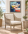 Bristol Harbor Cottage Striped Accent Chair in room with boat art