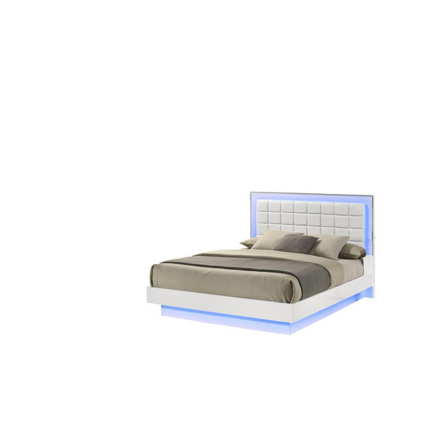 White Eastern king size bed with a plateform frame and adjustable LED lighting