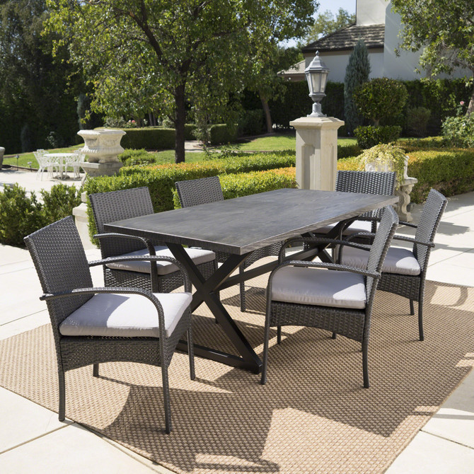Ashley Outdoor 7 Piece Grey Aluminum Dining Set with Grey Wicker Dining Chairs and Grey Water Resistant Cushions