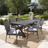 Adinia Outdoor 7 Piece Grey Aluminum Dining Set with Grey Wicker Dining Chairs and Grey Water Resistant Cushions