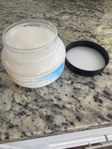 Comes in 8 oz plastic jar with screw lid.