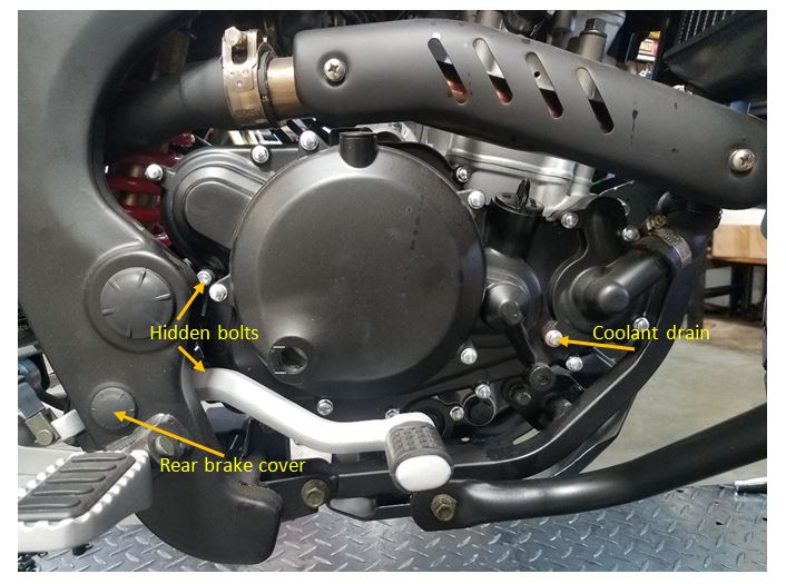 RX3 hidden bolts coolant drain rear brake cover