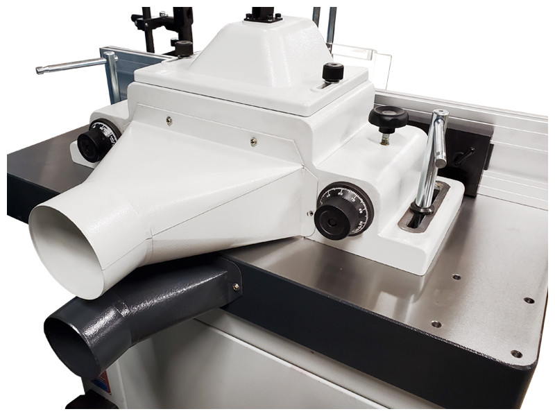 Precision fence with micro-adjustment of infeed and outfeed fences 
The fence assembly is also made from cast iron, adding to the robustness of this shaper series. The infeed and outfeed fences can be micro metrically adjusted in and out by dial. The fence assembly can also be positioned in and out by releasing the locking handles. Two dust ports are included with the machine for the fence and table, providing superior dust removal. The table is pre-drilled to accept a power feeder