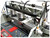 Material Clamping System
 (4) pneumatic clamps with individual lever activation ensure the workpiece is held firmly during machining operations.
