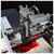 Self-indexing drill unit The drill bit is designed to bore the location hole for the drawer slide. The drill head is powered by compressed air, and automatically indexes left and right depending on the side of the drawer being machined. The machine uses a ¼" drill bit.