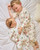 Caramelo Baby Boys Ivory Festive Print Sleepsuit 0341249