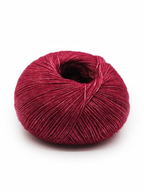 ball of yarn of Mirasol, color Garnet 07
