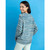 back of sweater, image of model wearing Mirasol Knit pullover and scarf in 100% alpaca Mismi Yarn 