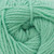 Manufacturer's closeup image of Cascade Yarns Cherub Aran – Beach Glass 131, Soft blue-green yarn with coastal charm. Cascade Cherub Aran Beach Glass 131 is perfect for baby projects, accessories, and easy-care knits. Manufacturer's closeup image of Cascade Yarns Cherub Aran – Beach Glass 131, Soft blue-green yarn with coastal charm. Cascade Cherub Aran Beach Glass 131 is perfect for baby projects, accessories, and easy-care knits.