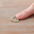image of finger showing size of stitch marker