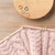image of stitch marker in pink knitting