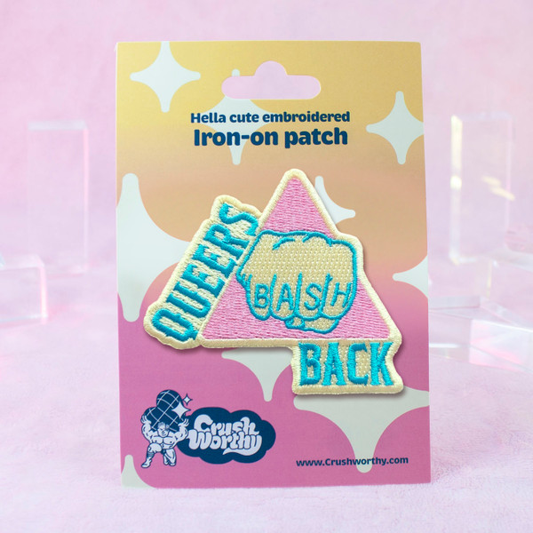 Queers Bash Back (Trans) Patch by Crushworthy – pastel pink, pastel blue, and off-white embroidery for queers that BASH BACK on an iron-on backing!