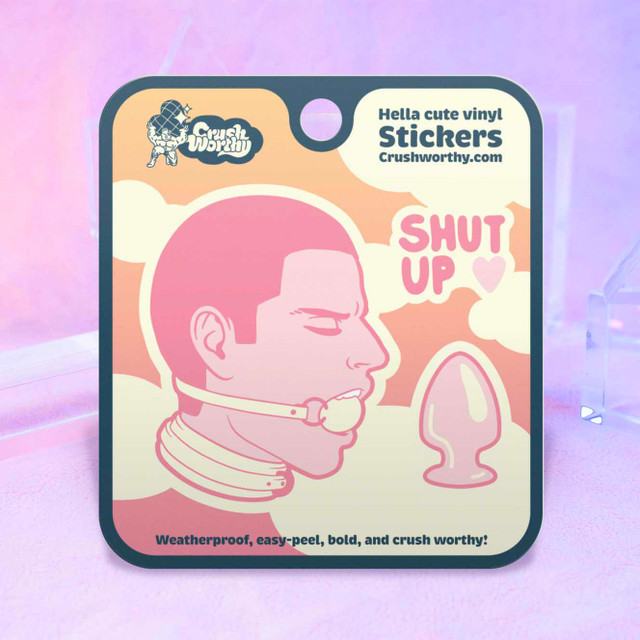 Simply Gagged sticker sheet by Crushworthy - A cute stylized pink sticker of a guy with a ball gag, comes with a little buttplug mini sticker and a "shut up" mini sticker with a little heart!