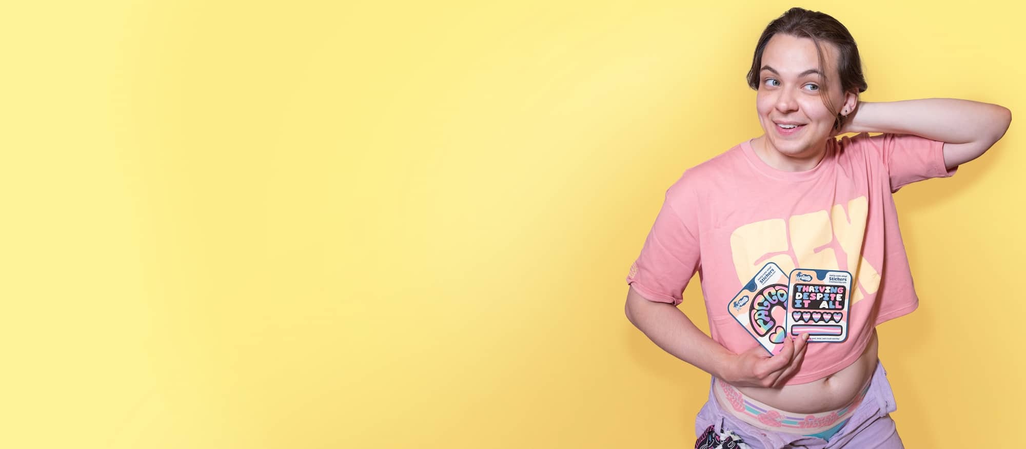 Kasper holding stickers - Cute clothes for cute queers