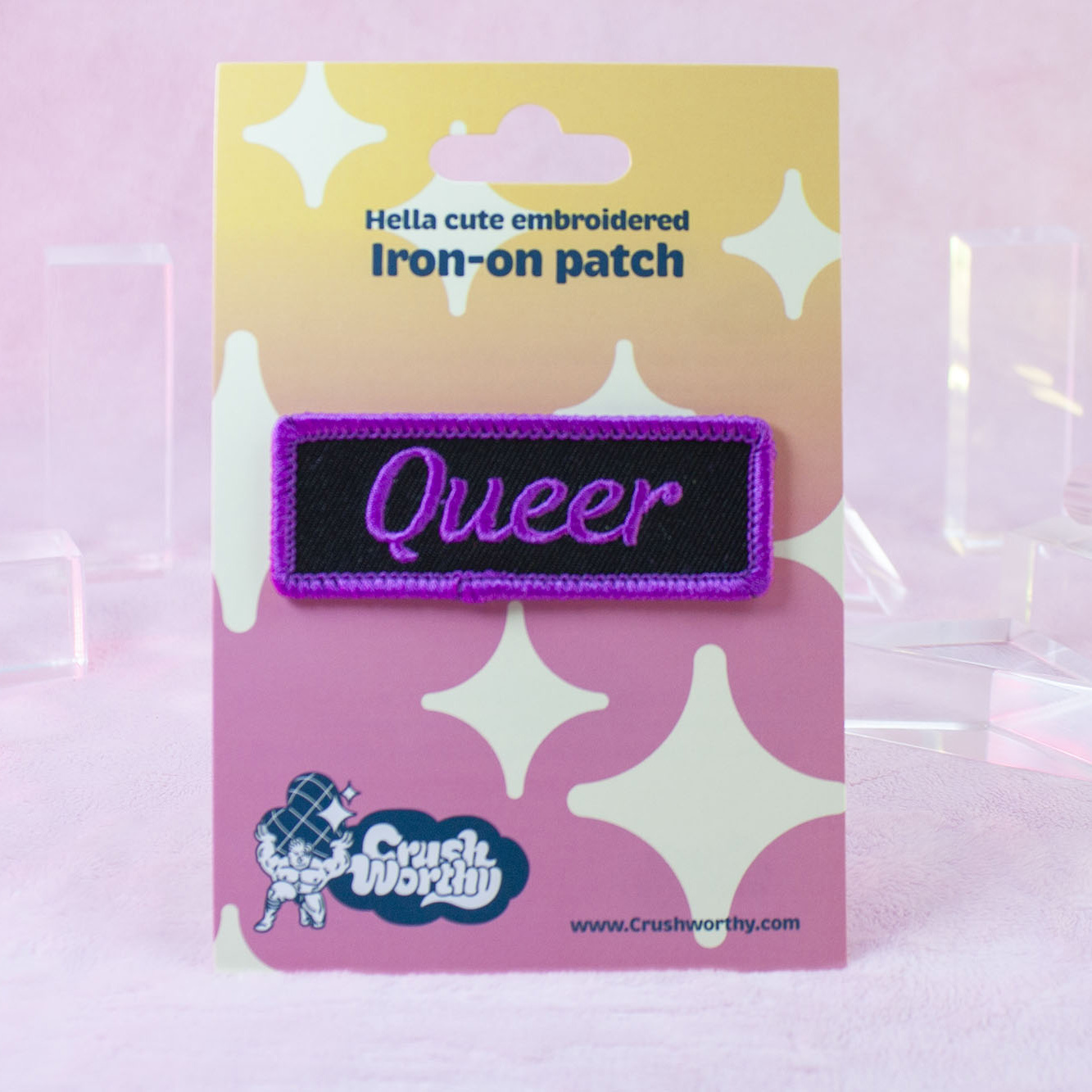 Queer patch by Crushworthy - A purple and black patch styled after mechanic name tag patches, perfect for jackets!