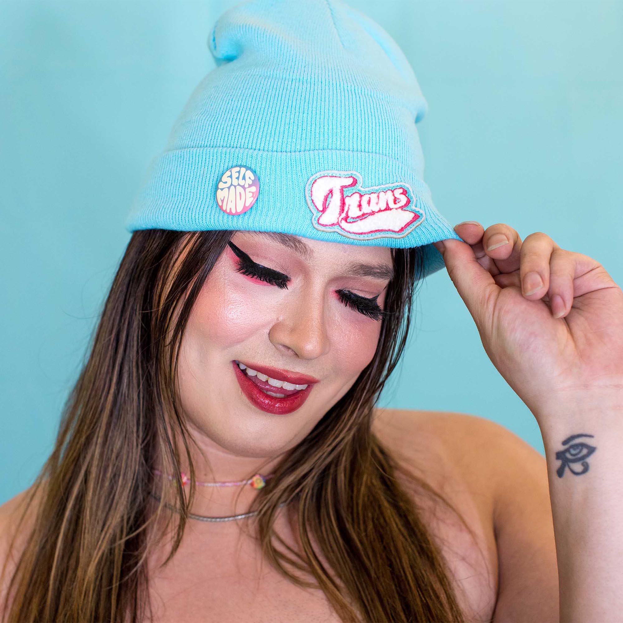 Trans Beanie by Crushworthy - Fuzzy chenille embroidery that says "Trans" in varsity-style letters on a hella cute pastel blue beanie!
