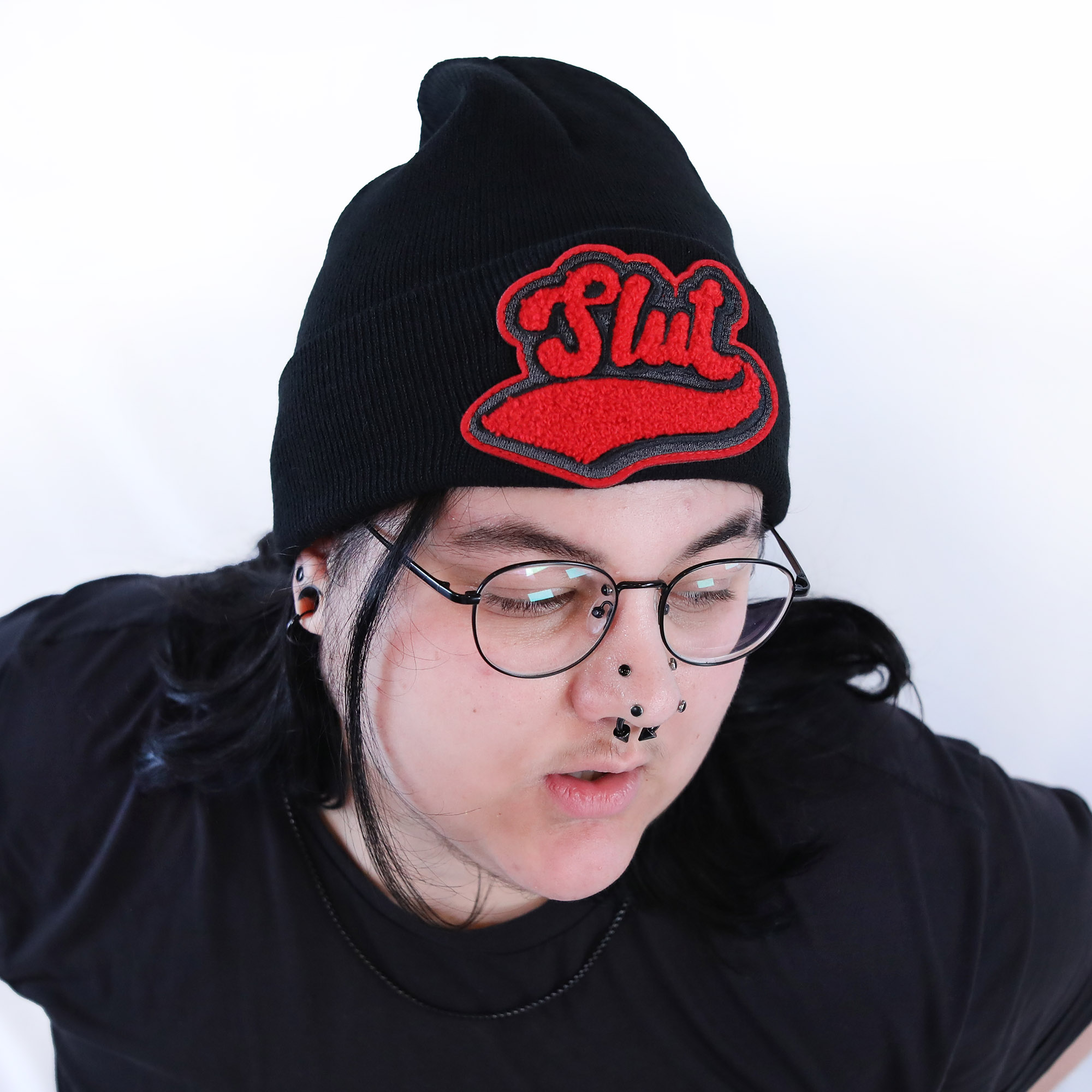 Slut Varsity beanie by Crushworthy - Red and black fluffy chenille embroidery on a cute black beanie