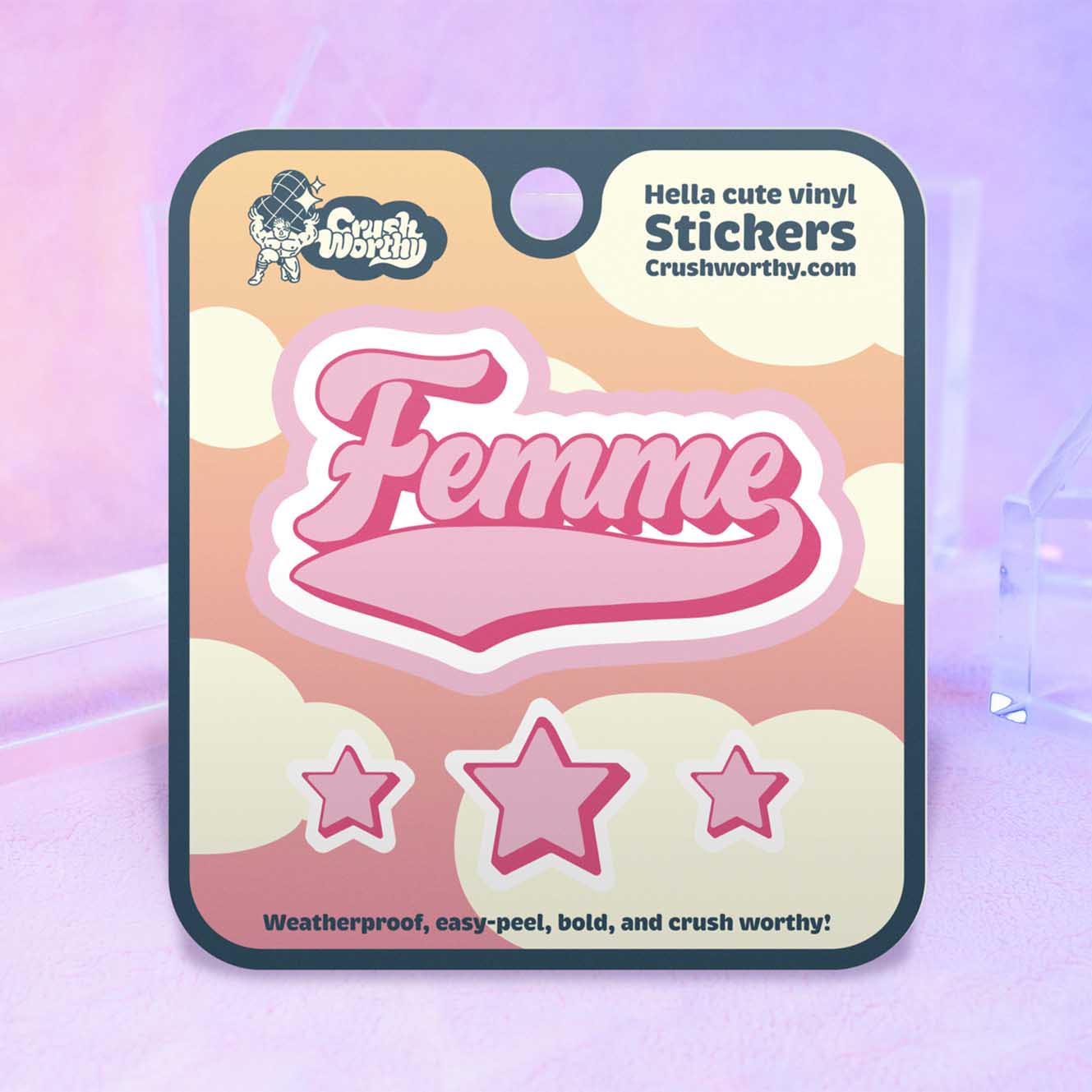 Femme Varsity sticker sheet by Crushworthy - A pink and white sticker that says "Femme" in varsity style lettering. Comes with 2 mini matching star stickers!