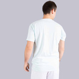 Back view of Pickleball Central's Heritage Pickle-ball Groovy Front Logo Unisex T-Shirt on a male model in the color Ice-Blue.