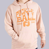 Close up front view of the Pickleball Central Heritage Pickle-ball Groovy Front Logo Unisex Hoodie on a male model in the color Dusty Pink.