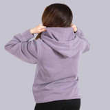 Back view of the Pickleball Central Heritage Pickle-ball Groovy Front Logo Unisex Hoodie on a female model in the color Plum.