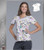 Cherokee Tooniforms Doodle Family Women's V-Neck Short Sleeve Top
