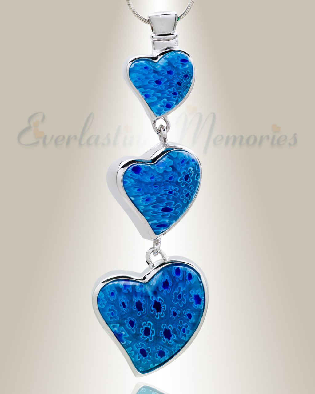 blue statuesque hearts cremains pendant to safely store ashes