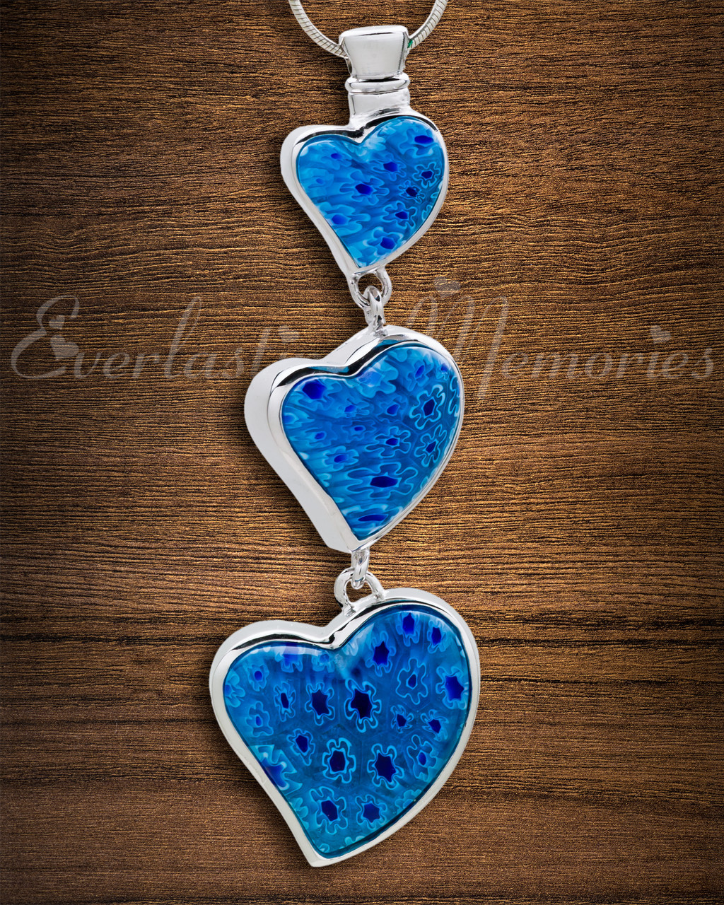blue statuesque hearts cremains pendant to safely store ashes