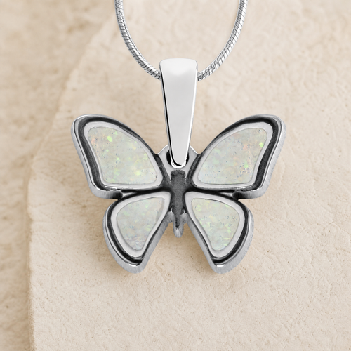 Lovable Butterfly Sterling Silver with Crushed Cream Opal Ash Resin Jewelry