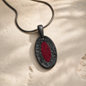 Heartfelt Oval Black Finish with Scarlet Pearl Opal Ash Resin Jewelry