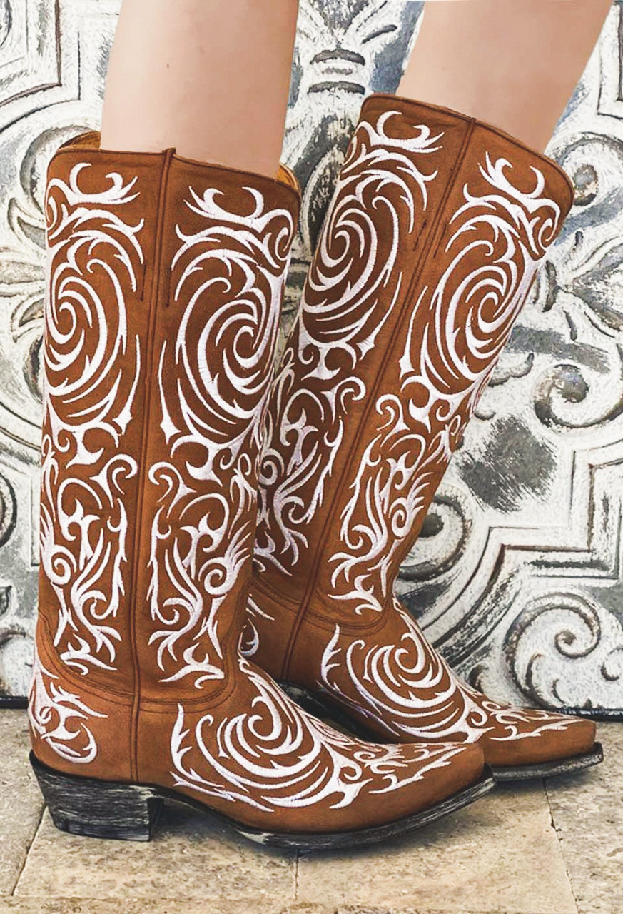 white embroidered boots