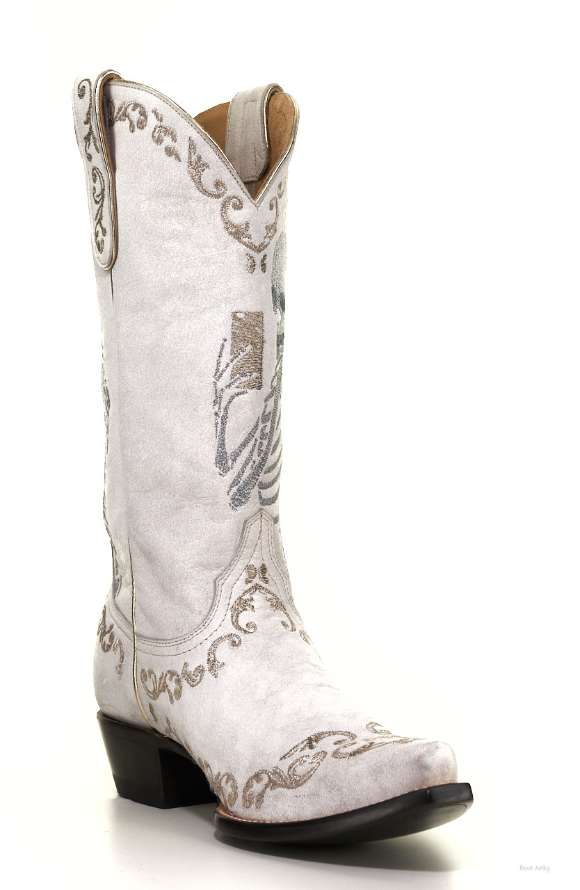 white embroidered boots