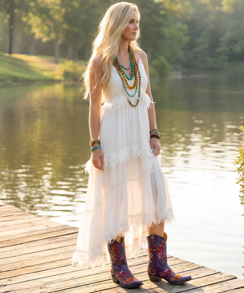 Old Gringo – Jasmine Boots

The Jasmine Boots by Old Gringo are a perfect choice for just about any occasion. Crafted from genuine leather and handcrafted with care, these beauties feature vibrant floral hand-stitching that adds a colorful, feminine touch to a classic western silhouette.

Designed with a sleek snip toe and a comfortable 9964 western heel, the Jasmine boots are effortlessly wearable day or night. Style them with your favorite skinnies for a casual look or pair them with a dress for a fun night out—they’re as versatile as they are beautiful.

Details:

Brand: Old Gringo

Colorful floral hand-stitched design

Toe: Snip Toe

Heel: 9964 Western Heel

Shaft Height: 10"

Shaft Circumference: 10"

Genuine leather

Handcrafted leather

A timeless western favorite with a colorful twist—easy to wear and impossible not to love. ?✨