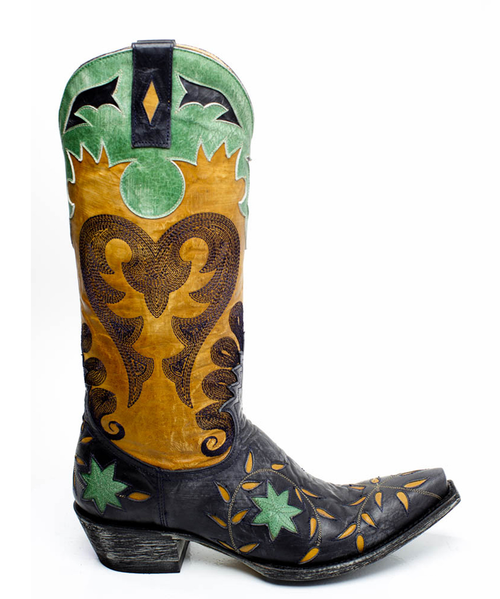 Gotta love the colors on the Old Gringo Letty Boots L1115-5. The deep navy blue & gold boot shaft mixes beautifully with the green leather accents. The Letty boot was made for ladies looking to make a bold fashion forward statement. The floral designs on the toe are beautiful and the heart shaped embroidery on either side of the boot shaft gives it a sassy finish.