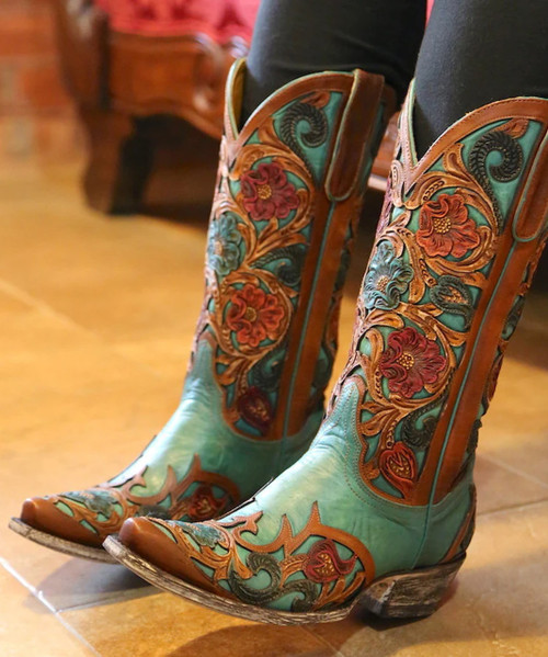 * Abelina features a beautiful hand tooling floral pattern creating a vintage romance feel.
*
* Style number: L2408-4.
*
* Premium Goat Leather.
*
* 13 inch turquoise foot and shaft.
*
* Brown/floral hand-tooled overlay detail.
*
* Snip toe.
*
* Single stitch welt.
*
* Leather lining.
*
* Leather/cushioned insole.
*
* Leather outsole.