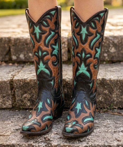 urn some heads in these beautiful Mayra Boots from Old Gringo! 
Constructed from a rich, silver metallic leather, this boot features embroidery in the classic Mayra pattern.