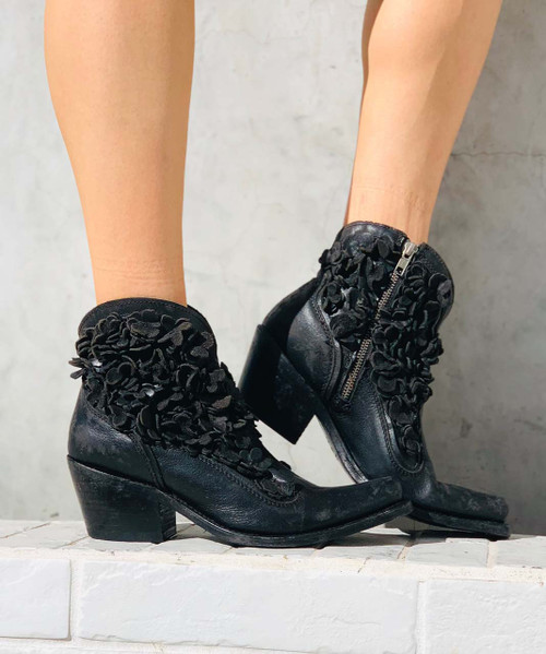 Rock in your flower child spirit in the Nero Black leather boots by Liberty Black. 
 
Women's leather boots with catchy floral leather flowers. The interior is soft calf 
leather with a padded leather insole for comfort. The exterior is goat leather 
enhanced by an intricate floral pattern on the upper...

Brand new to the market...these boots are as unique as they are beautiful.