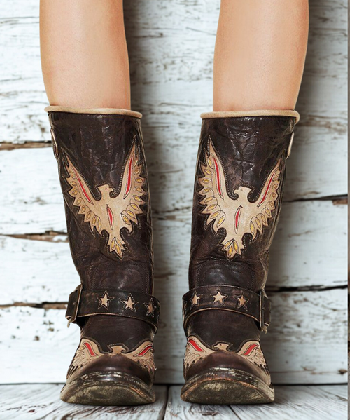 Old Gringo Biker Eagle is a funky pair of chocolate brown and bone distressed leather biker boots decorated with eagle designs and harness accents. The heel and rounded toe are very comfortable and the biker look becomes complete with the large buckle at the ankle. 