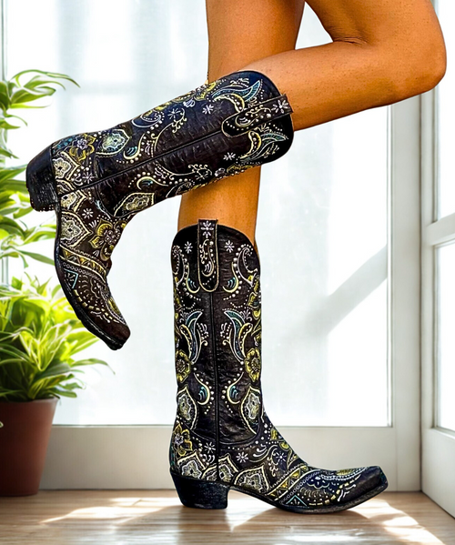 In a word, gorgeous! It's the only way to describe the Old Gringo Olivia Stud Boot Junky Exclusive leather boots...Intricate, colorful embroidery decorates the azul blue leather background. What can you wear them with? Anything and everything! With floral patterns and whimsical designs etched with beautiful colored thread, you'll be able to wear the Olivia Boots with any outfit during any season. Old Gringo handcrafters are known for their flawless, eye catching embroidery. You will turn heads left and right in the Old Gringo Olivia Cowgirl Boots!
Measurements:
Shaft Height: 13" 
Shaft Circumference: 14" 
Heel:  9964 (Traditional)
Toe: 4L (Snip) In a word, gorgeous! It's the only way to describe the Old Gringo Olivia Stud Boot Junky Exclusive leather boots...Intricate, colorful embroidery decorates the azul blue leather background. What can you wear them with? Anything and everything! With floral patterns and whimsical designs etched with beautiful colored thread, you'll be able to wear the Olivia Boots with any outfit during any season. Old Gringo handcrafters are known for their flawless, eye catching embroidery. You will turn heads left and right in the Old Gringo Olivia Cowgirl Boots!
Measurements:
Shaft Height: 13" 
Shaft Circumference: 14" 
Heel:  9964 (Traditional)
Toe: 4L (Snip)