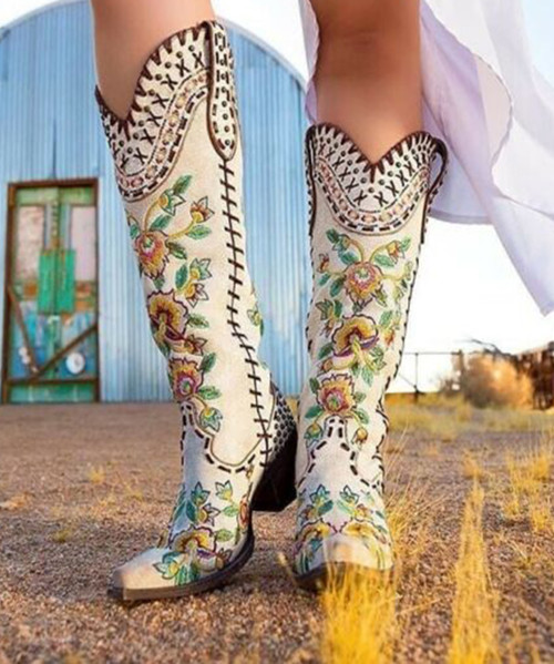 The Double D by Old Gringo Almost Famous boots are not "Almost Famous"...they are over the top FAMOUS!!!
Fashioned with studding on the heel and exceptional embroidered detailing these boots are one of a kind. 
The unique floral embroidered multicolored flowers set the tone for a boot that is destined to be a favorite for years to come.