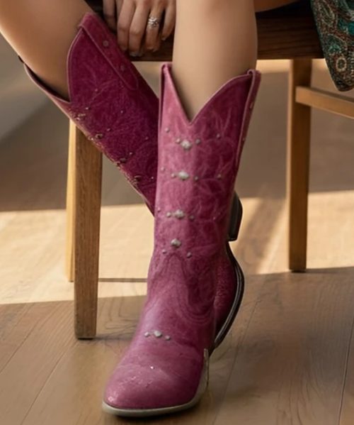 urn some heads in these beautiful Mayra Boots from Old Gringo! 
Constructed from a rich, silver metallic leather, this boot features embroidery in the classic Mayra pattern.