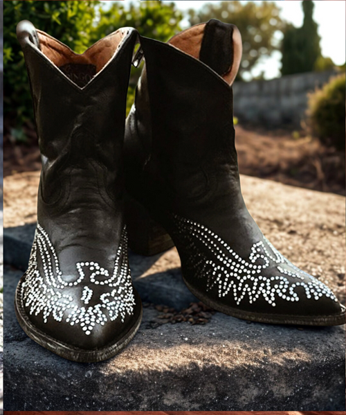 WHAT AN INCREDIBLE FIND!!!  OLD GRINGO EAGLE SWAROVSKI ZIPPER ANKLE BOOTS IN BLACK NOVULARIS CALFSKIN LEATHER.  THESE GORGEOUS BOOTS ARE ADORNED WITH SWAROVSKI CRYSTALS IN AN EAGLE PATTERN IN JUST THE RIGHT SPOT SO THEY ARE VISABLE TO ALL.  WITH THE HIGHER FASHION HEEL AND TRADITIONAL TOE, ALL DAY COMFORT IS A CERTAINTY.

