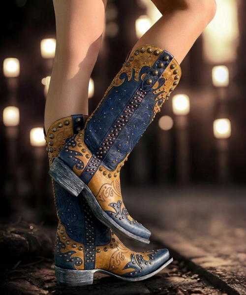 This stunning boot is studded to perfection! We are head over heels crazy about the Old Gringo Raelene Cowgirl Boots! You'll love the versatile color combination of navy and buttercup leather. The Raelene is decorated throughout with large and small studs that add a seriously cool vibe to a western boot silhouette. Pair them with any outfit during any season for a sultry look!