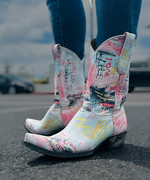 Have you ever wondered what it would be like if YSL and Old Gringo collaborated and came up with a divine creation...well we did and here's what we discovered...introducing "From Here to Infinity" Cl in the most divine diva-licious leather you have ever laid eyes on...no two pair will be identical, and we only have limited leather available so grab a pair before their gone.

Shaft -10"

Toe - 4L Snip Toe

Heel - 9964