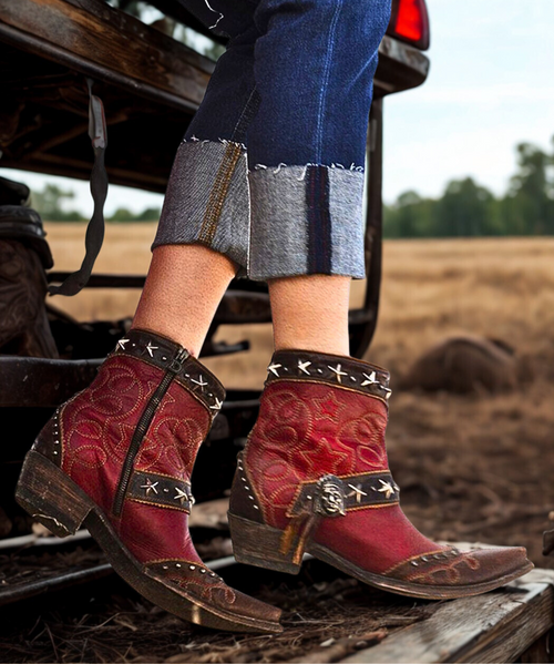 Pair these gorgeous Double D Ranch Red Born In The USA shortie boots with bare legs and jean shorts and you’ve mastered the art of staying cool while looking even cooler.

(Of course, we love this pair for Born in the USA, because they’re a rich, bold red, accented with silver stars.)

leather: leather 
heel: riding
features: nail heads, contrast leather , Indian head, stars
Toe - Snip
Heel - 9964 Walking Heel